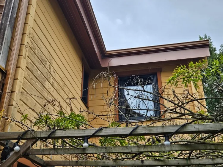 Installation d'une baie vitrée mixte bois-alu en Île-de-France — photo 3